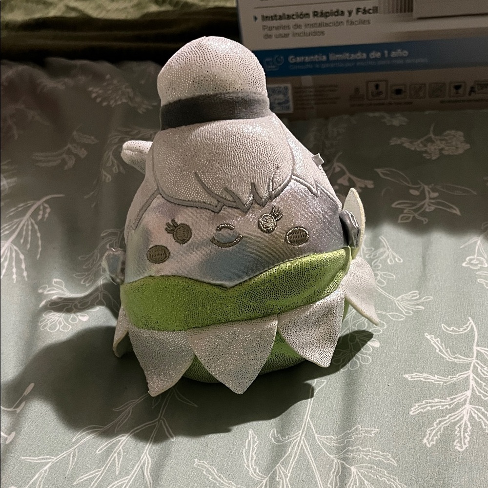 Gray and Green Plush Toy